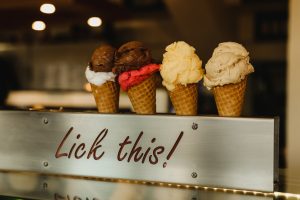 three ice cream cone on ice cream stand